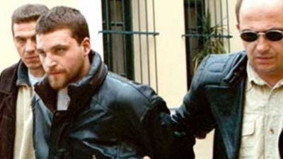 COMPLICELE LUI PASSARIS, găsit într-o închisoare spaniolă, încarcerat sub un nume fals