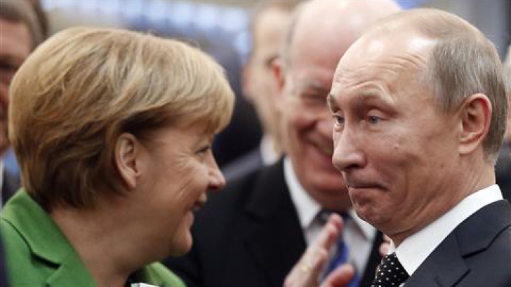 Vladimir Putin vrea să continue dialogul "preţios" cu Angela Merkel pe tema Ucrainei