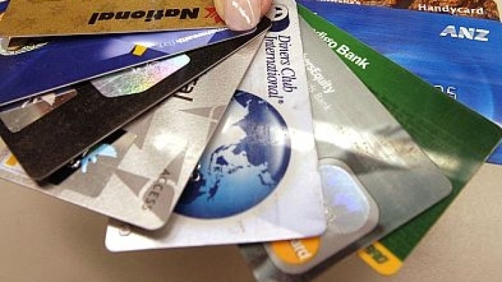 Percheziții în România și Franța la falsificatori de carduri bancare