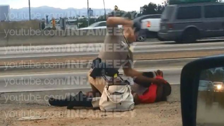 Femeie bătută de un poliţist, pe autostradă