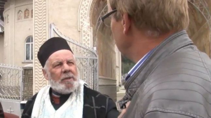 Preot celebru în România sare la bătaie cu crucea 