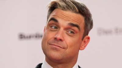 Robbie Williams, șoc pentru fani de Crăciun! S-a pozat complet gol 