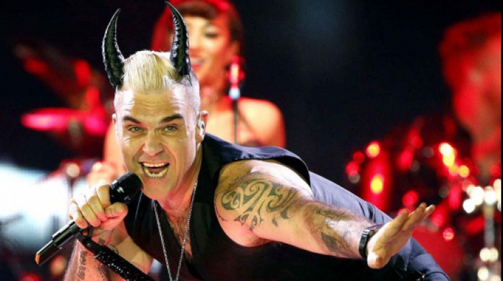 "Nu ştiam că-s atât de iubit aici," le-a spus Robbie Williams fanilor, la Bucureşti