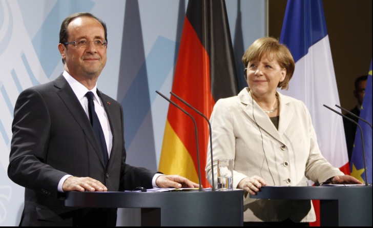Hollande și Merkel poartă discuții despre posibilitatea unui summit extraordinar al UE 