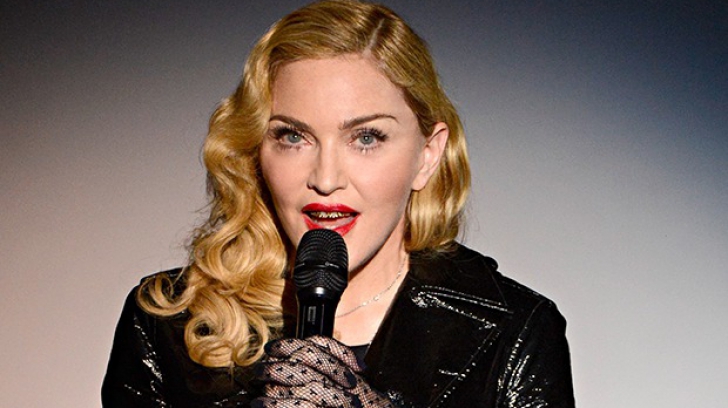 Madonna a pozat goală ca să îşi îndemne fanii să voteze cu Hillary Clinton