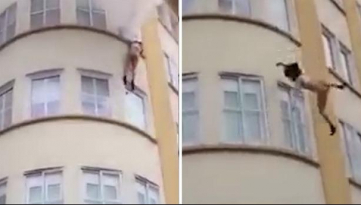 Imagini șocante. O femeie aproape dezbrăcată a sărit din calea focului, de la etaj