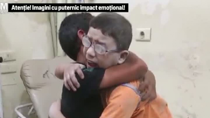 Durere fără margini a unor copii. Îşi plâng fratele ucis într-un bombardament, în Siria