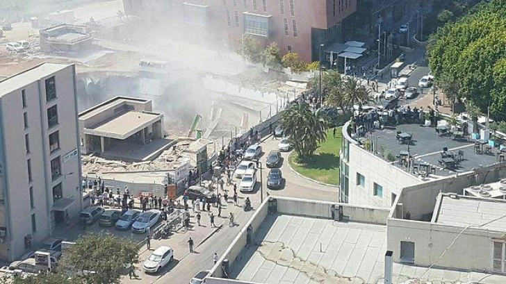 Macara prăbușită în Israel. Cel puţin 15 oameni prinşi sub dărâmături