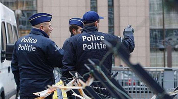 Poliţişti belgieni, arestaţi pentru că transportau imigranţi