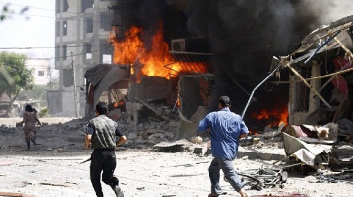 Cel puţin 18 oameni au murit într-o serie de atentate lansate în mai multe oraşe din Siria