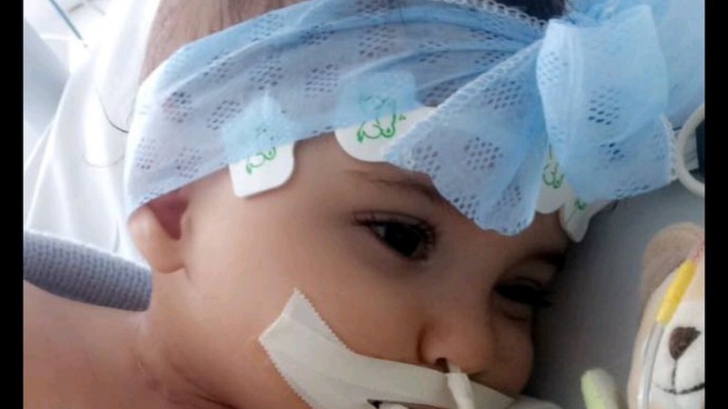 MIRACOL: medicii se pregăteau să o deconecteze de la aparate, când micuţa de 1 an s-a trezit