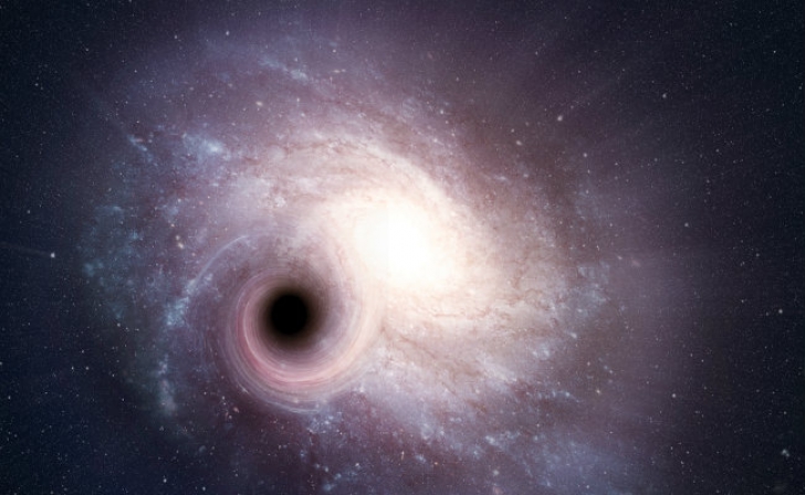 Au găsit o gaură neagră în spaţiu, de 660 de milioane de ori mai mare ca Soarele.Ce se ascunde acolo