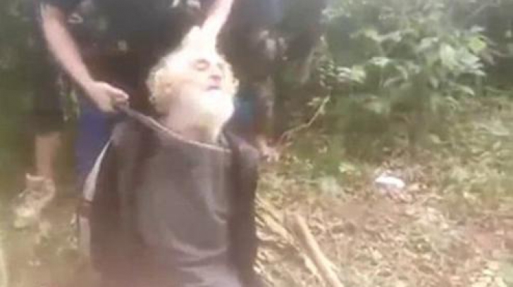 Imagini şocante! Un ostatic german a fost filmat de jihadişti înainte să fie decapitat