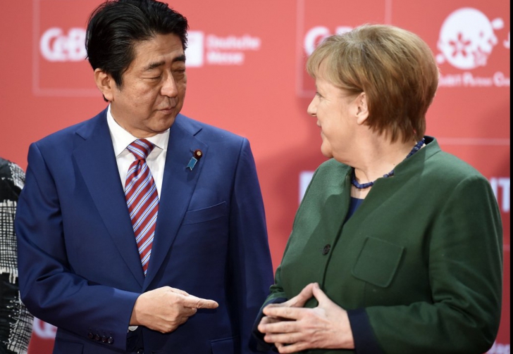 Angela Merkel și Shinzo Abe