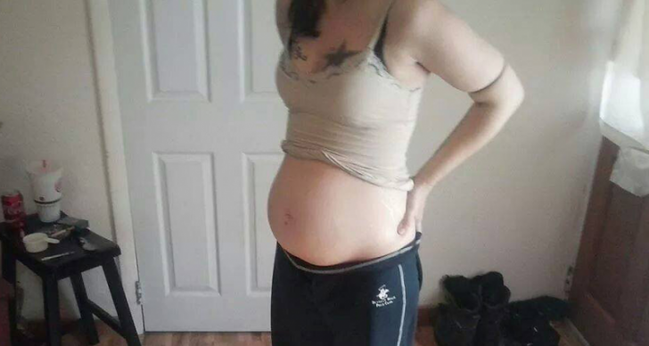A postat pe Facebook o poză cu burtica de gravidă şi a fost imediat ARESTATĂ de poliţie. Motiv-ŞOC