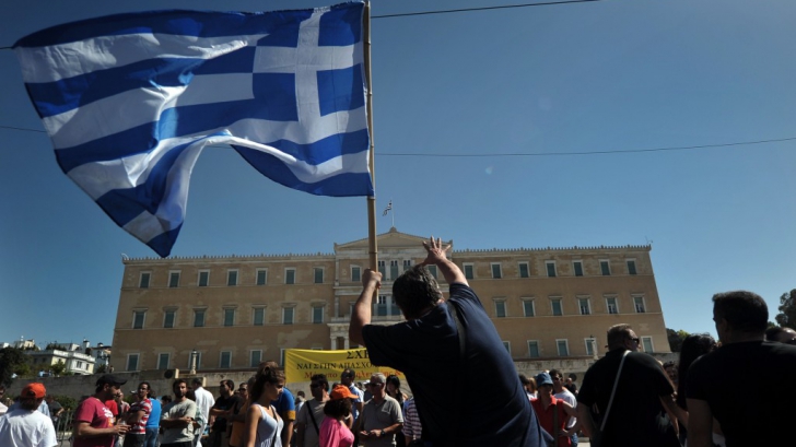 Grecia va beneficia de un acord preventiv de 1,8 miliarde de dolari aprobat de FMI 