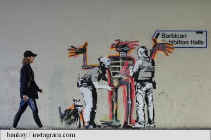 Două noi graffiti-uri semnate Banksy au apărut la Londra. Ce semnificaţie au