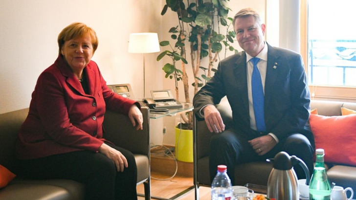 Klaus Iohannis, alături de Angela Merkel, la conferința de securitate de la Munchen
