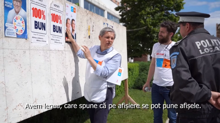 Dacian Cioloș, chestionat de un polițist local din Teleorman pentru că lipea afișe electorale