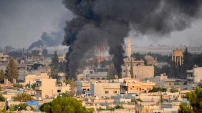 Zona bombardata in Ras al-Ain