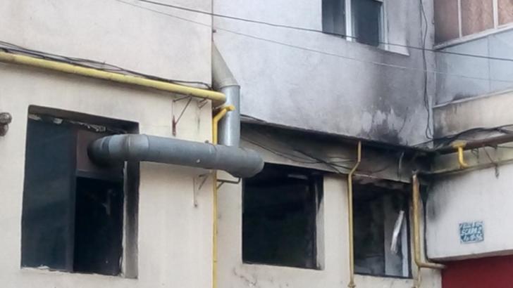 Incendiu la o fabrică de brânză situată la parterul unui bloc