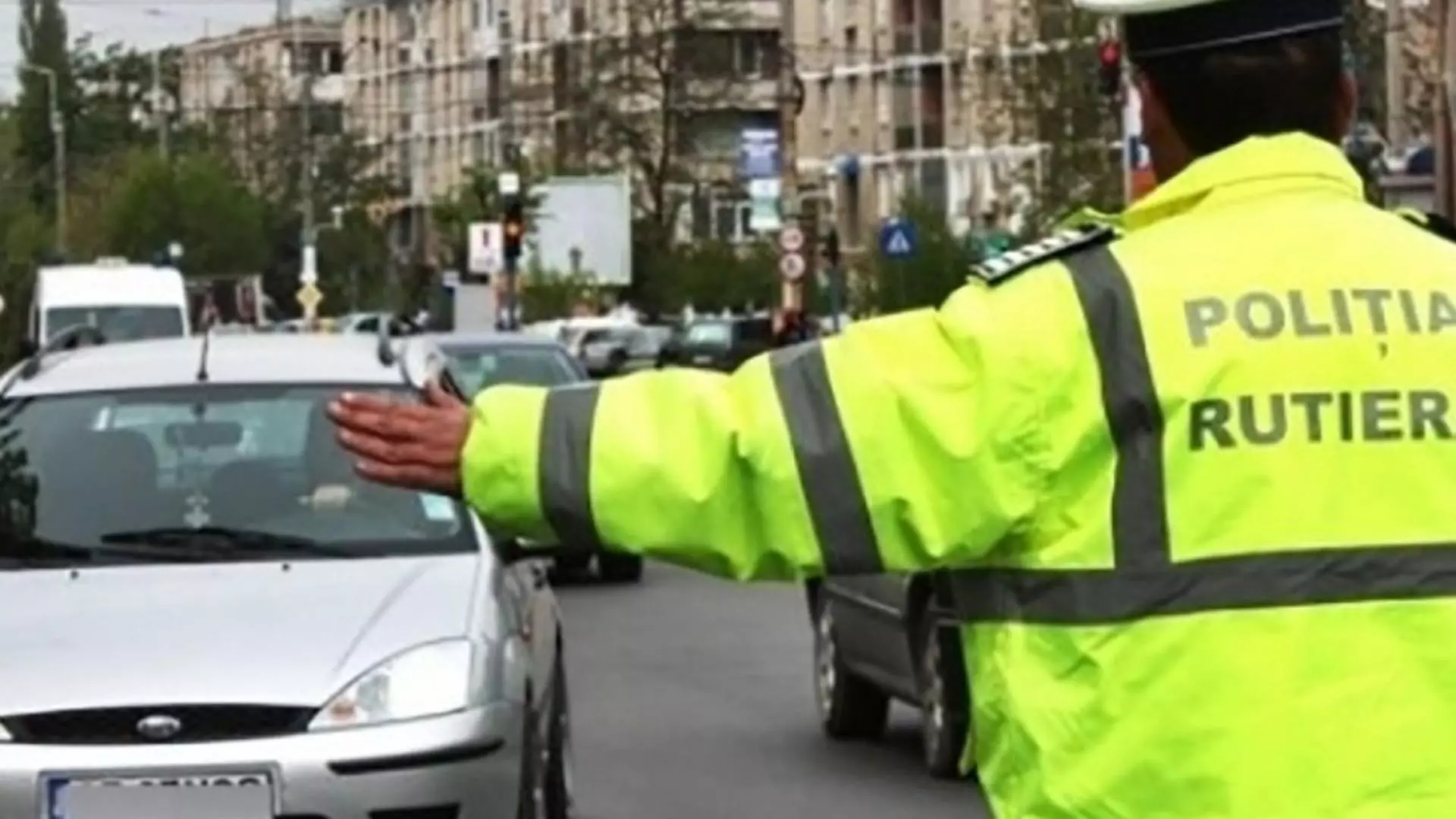 Amenințare cu pistolul în trafic