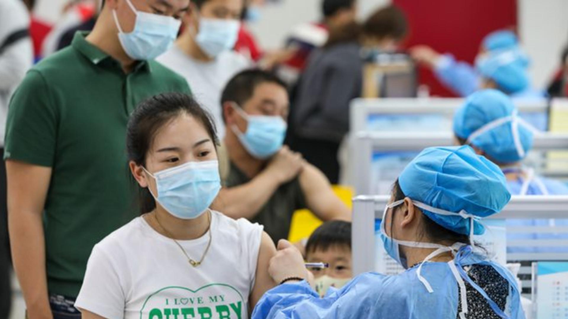 Record de infectări zilnice în China. Foto/Profimedia
