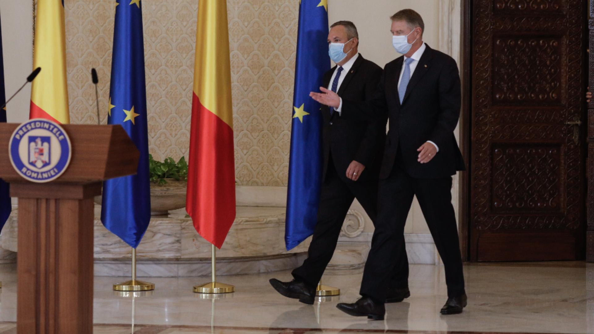 Premierul desemnat, Nicolae Ciucă, și președintele Klaus Iohannis / Foto: Inquam