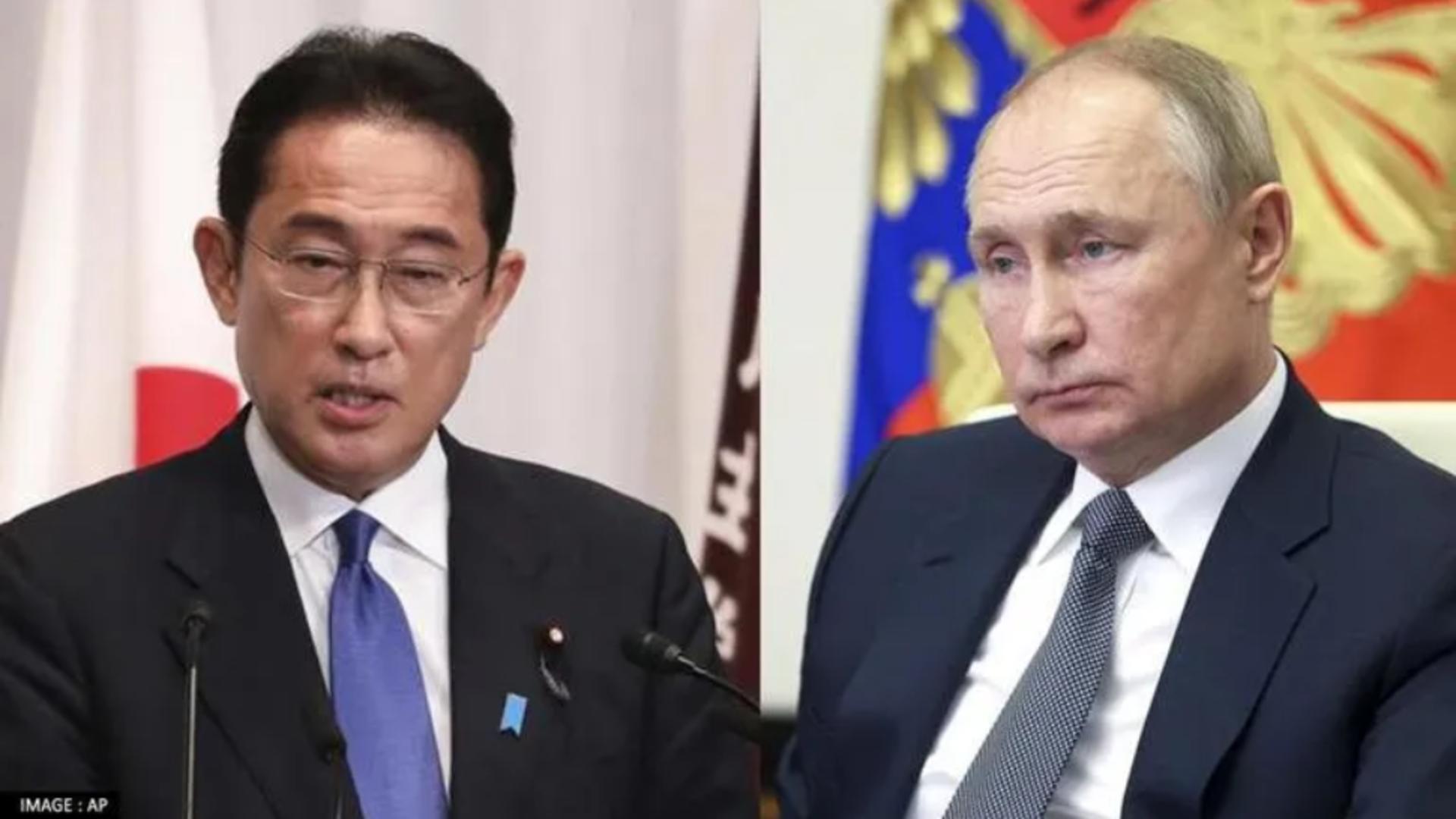  Fumio Kishida, premierul Japoniei, și Vladimir Putin, președintele rus