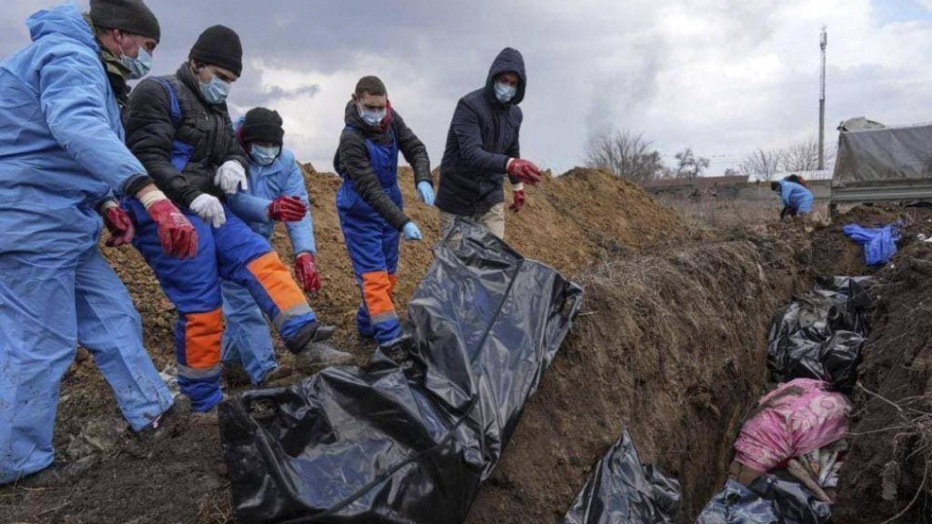 Gropi comune morți Ucraina/ Twitter Mihailo Podoliak