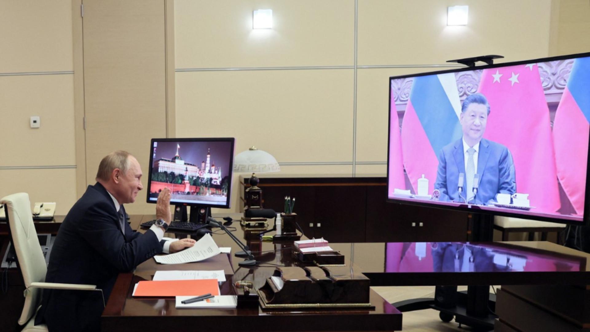 Vladimir Putin și Xi Jinping în teleconferință (dec. 2021 - Profimedia)