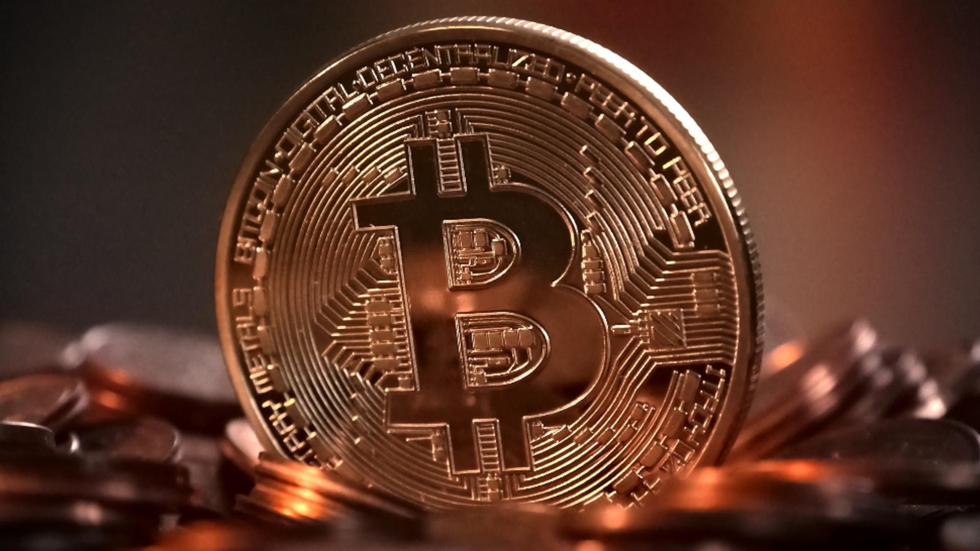 Bitcoin se apropie de un nou record ISTORIC. Cea mai cunoscută monedă virtuală a trecut de pragul de 60.000 de euro