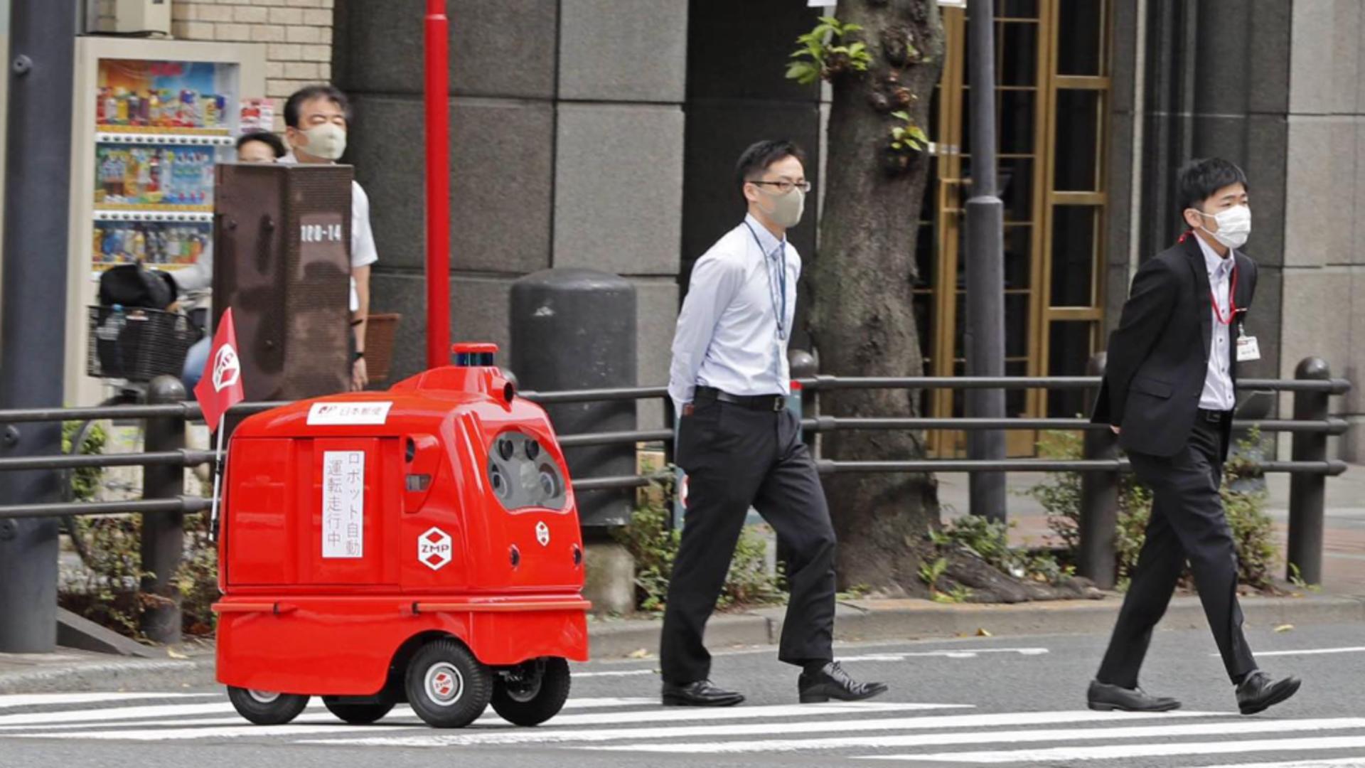 Roboți automați, fără pilot, liberi pe străzile din Japonia - Cum poate fi livrat un hamburger 