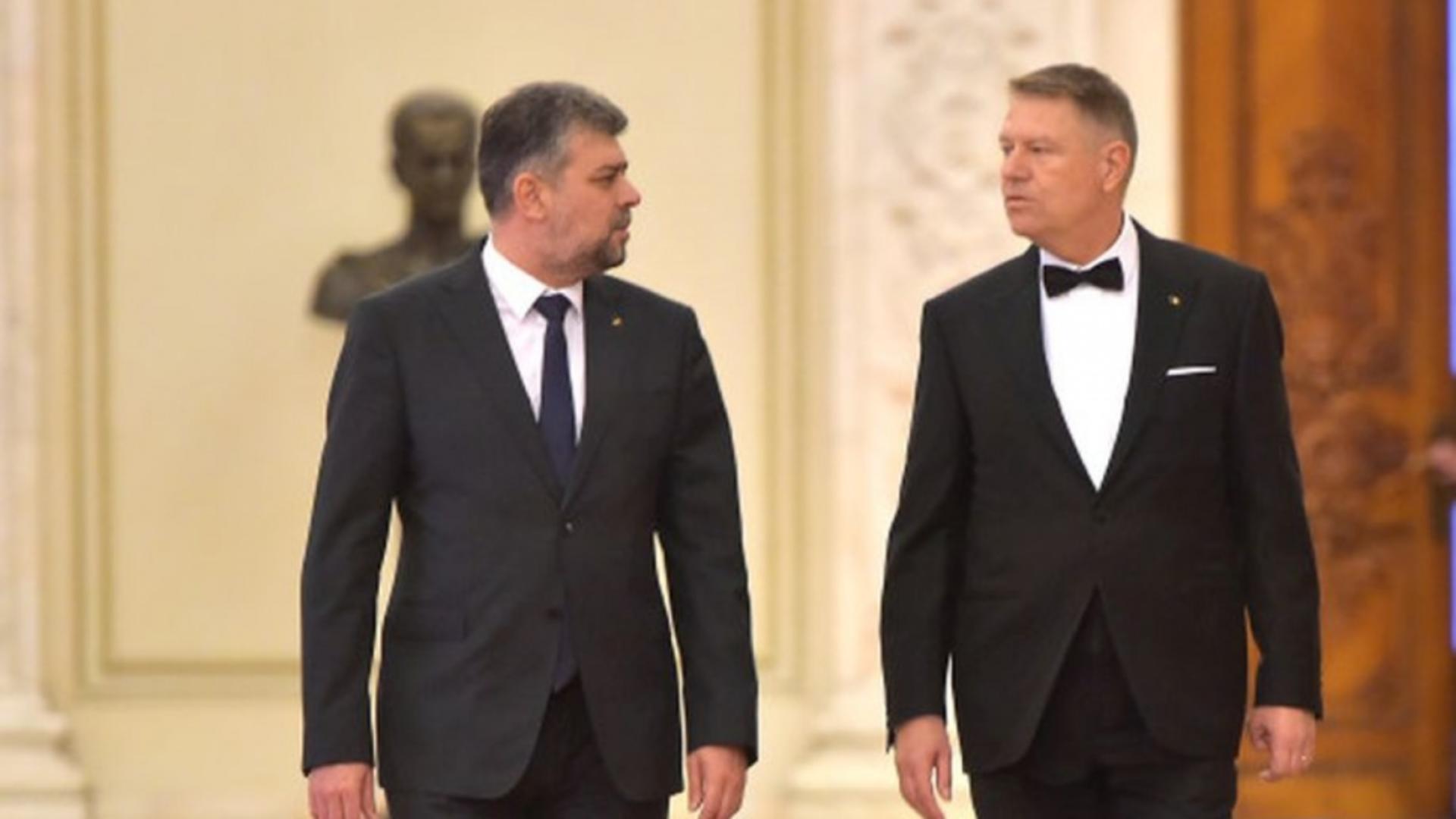 Premierul Marcel Ciolacu și președintele Klaus Iohannis 