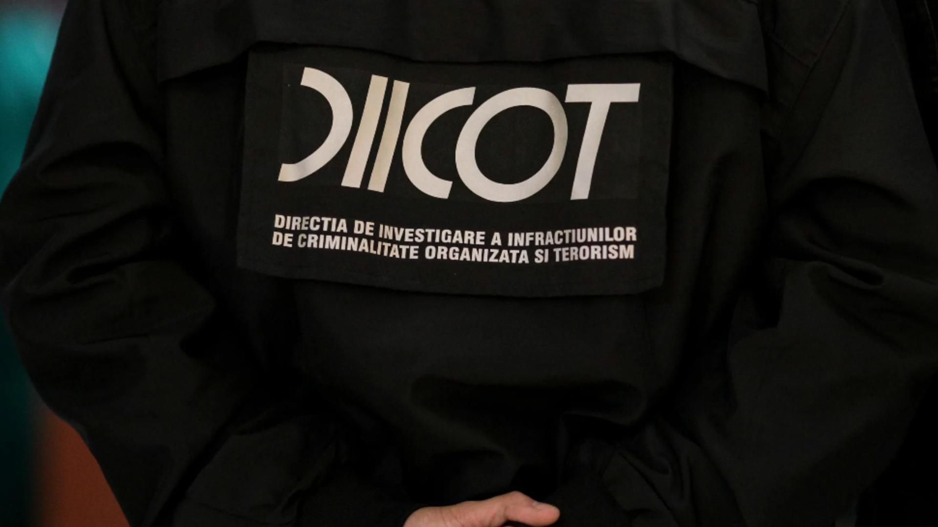 DIICOT, percheziții la o grupare care a trimis mesaje de ameninţare cu bombe la instituţii publice