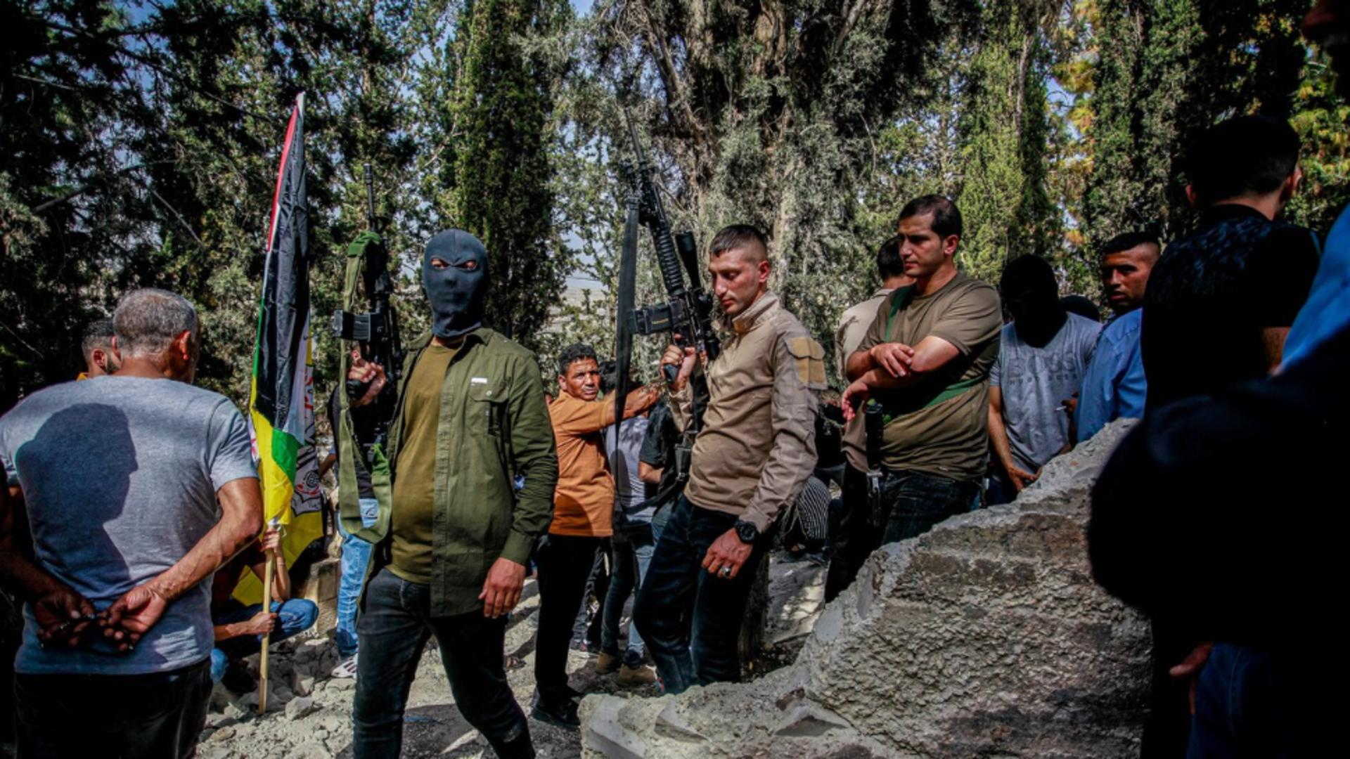 Brigadă Hamas în timpul unui raid (Profimedia)