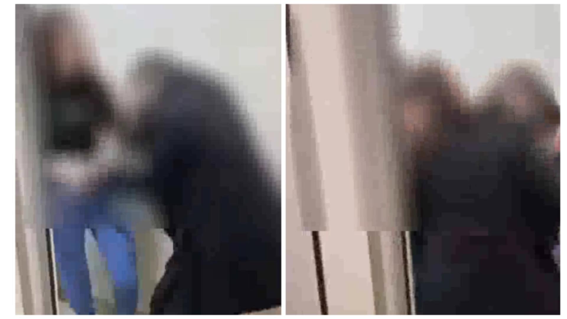 Două fete au fost filmate în timp ce își împărțeau pumni în toaletă, de față cu numeroși colegi. 