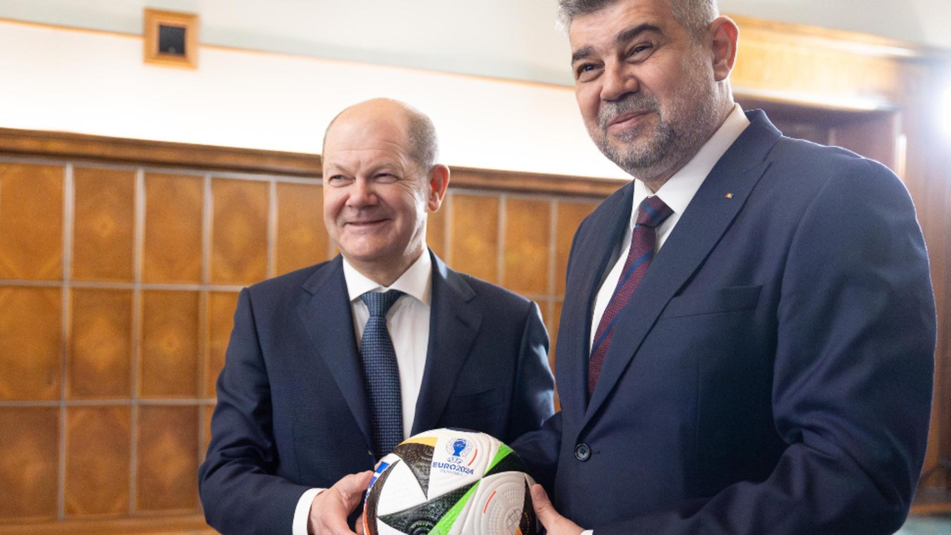 Fotbal și politică. Marcel Ciolacu i-a spus premierul german cu Olaf Scholz că e timpul ca România să încrie la EURO 2024