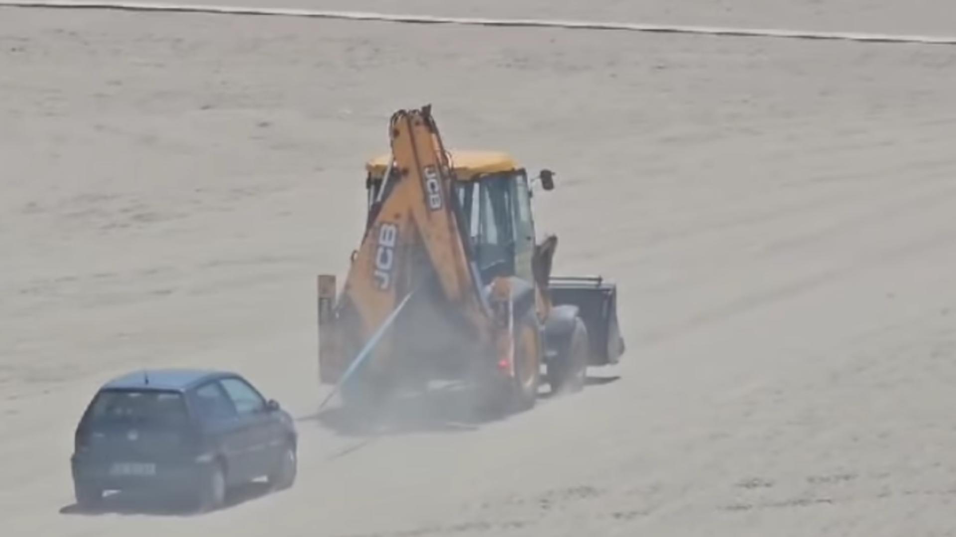 Amendă usturătoare pentru un șofer care s-a avântat cu mașina pe o plajă din Eforie Nord/ Captură video