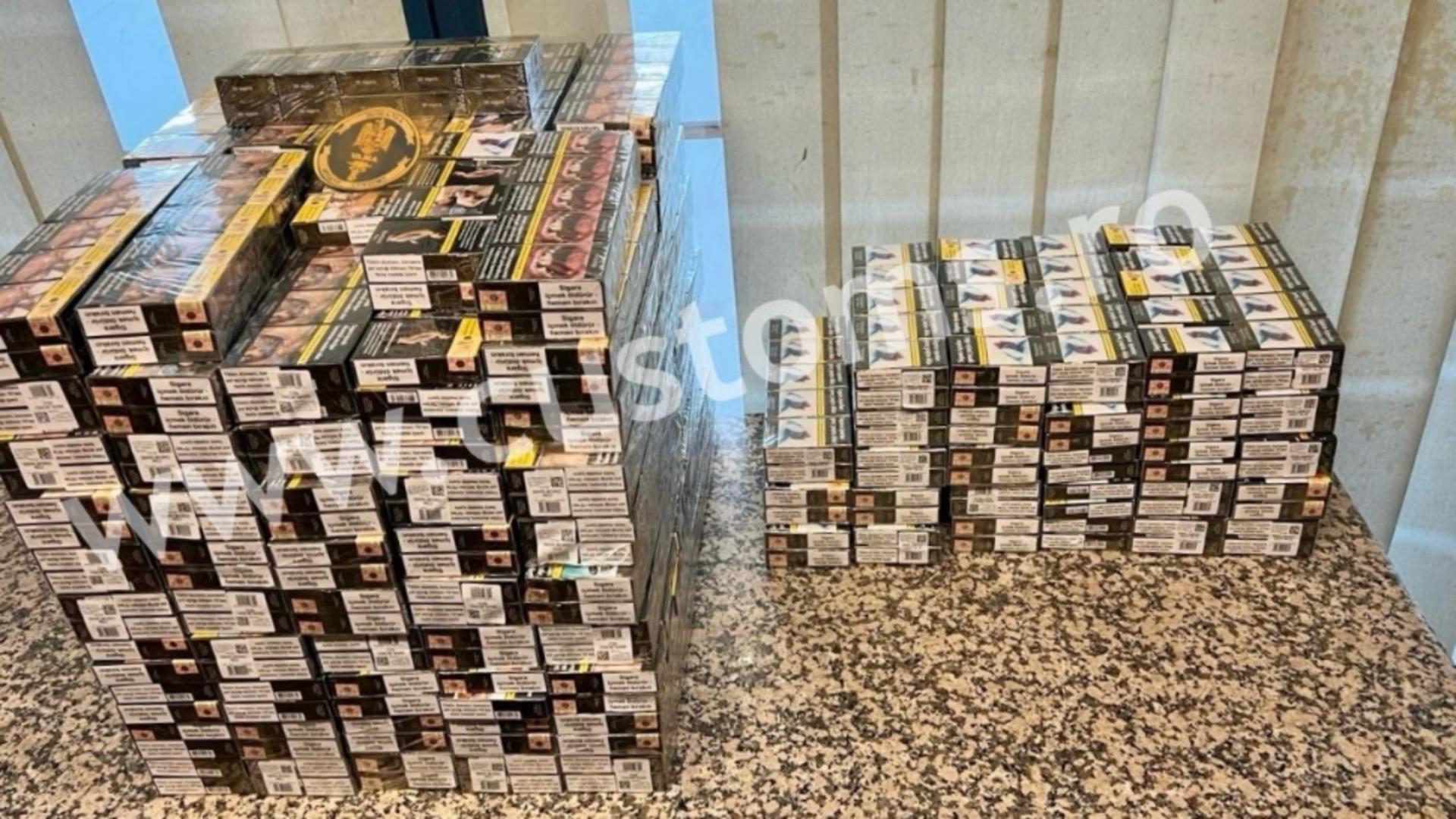 Femeie prinsă pe Aeroportul Henri Coandă cu 25.600 de țigarete nedeclarate. Pachetele erau ascunse în bagajul de cală
