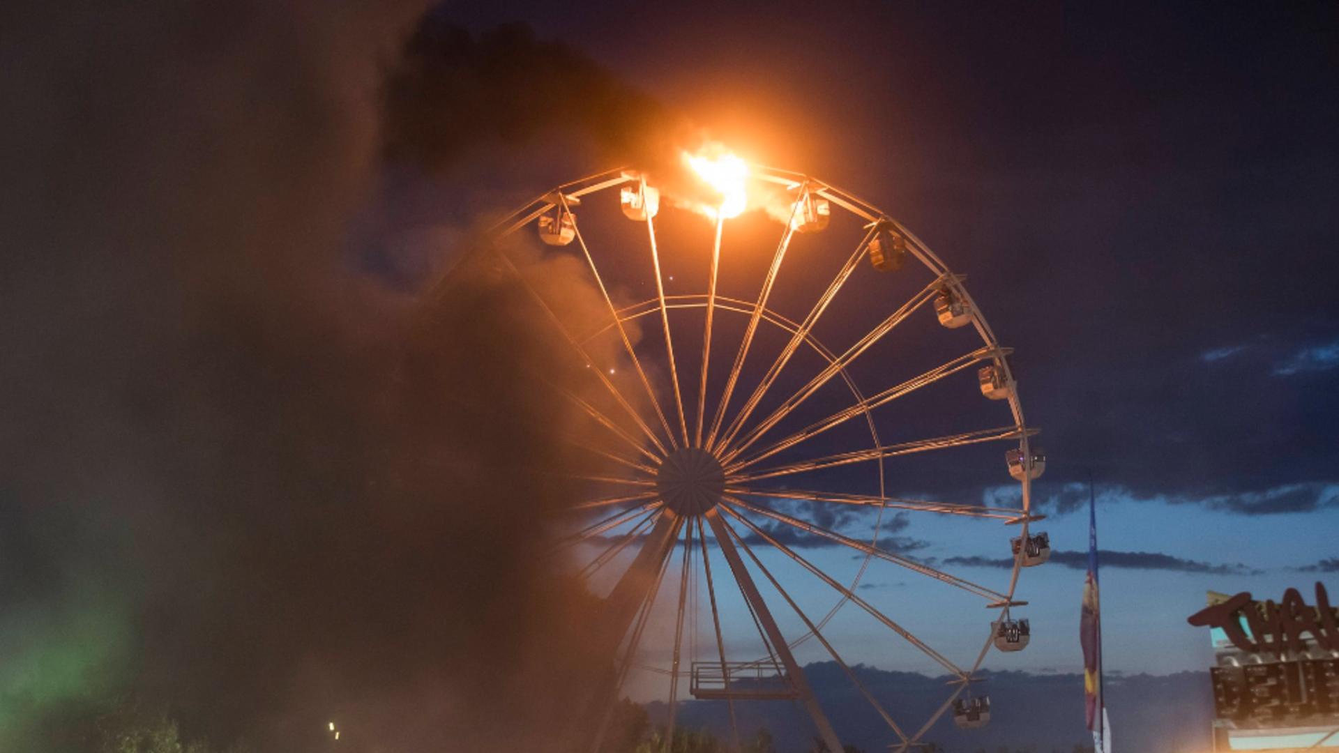 Cel puțin 25 de răniți, după ce o roată panoramică a luat foc, la un festival de muzică rock din Germania/ Foto: Profimedia