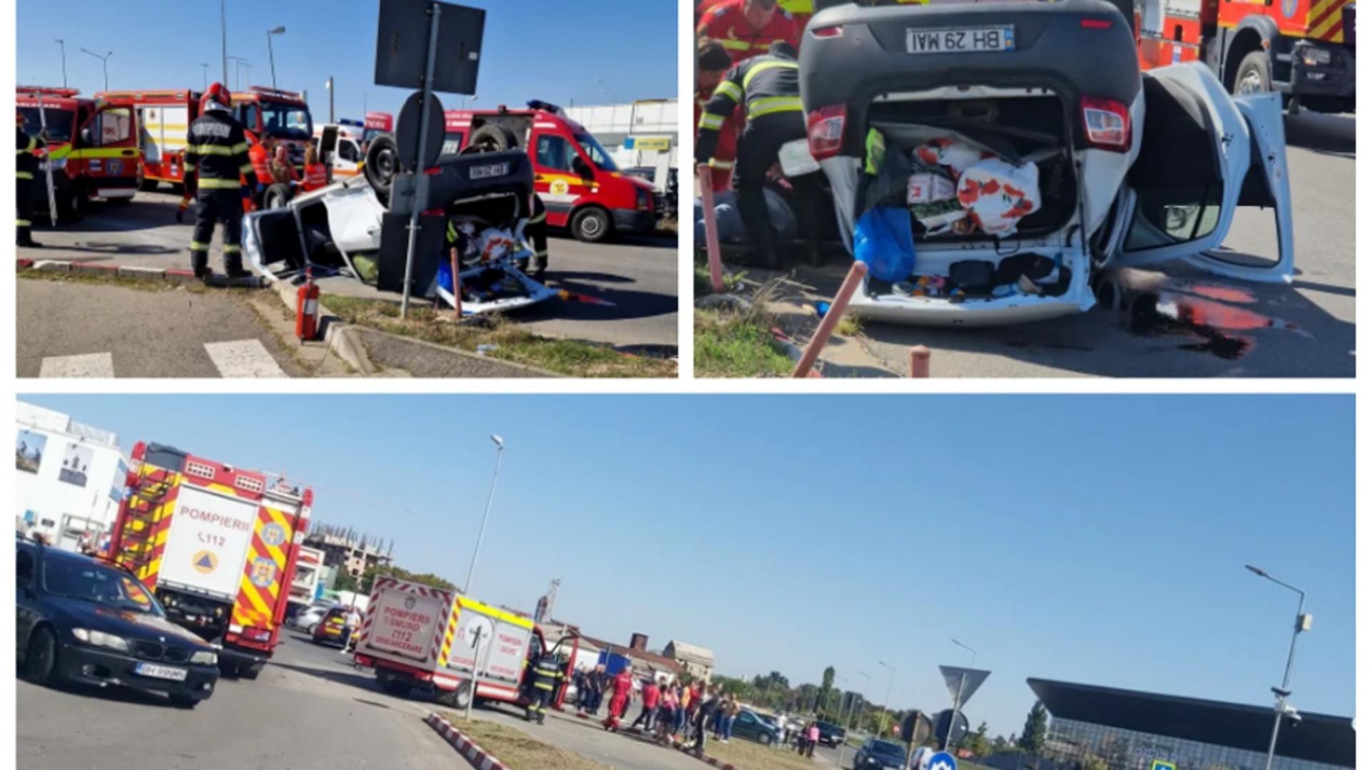 Accident rutier cumplit în Oradea: Mașină răsturnată în parcarea unui centru comercial 