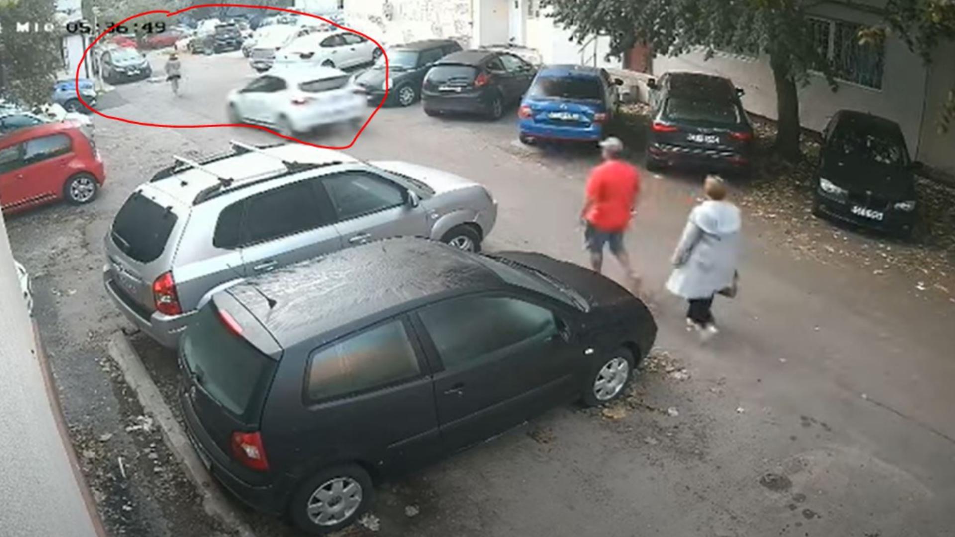 Femeia a fost luată în plin pe capota mașinii fostului concubin. Foto/Captură video