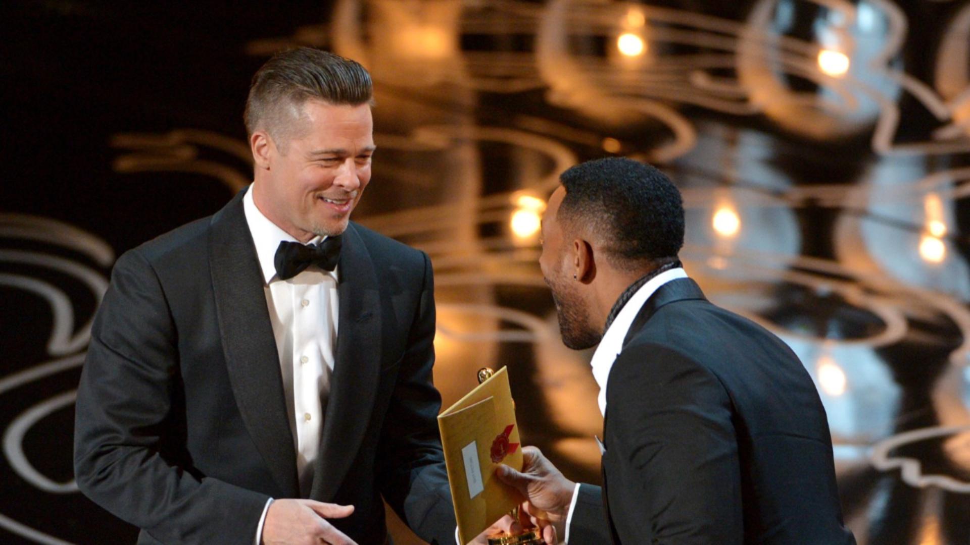 Brad Pitt și Will Smith la ceremonia Oscarurilor din 2014 (Profimedia)