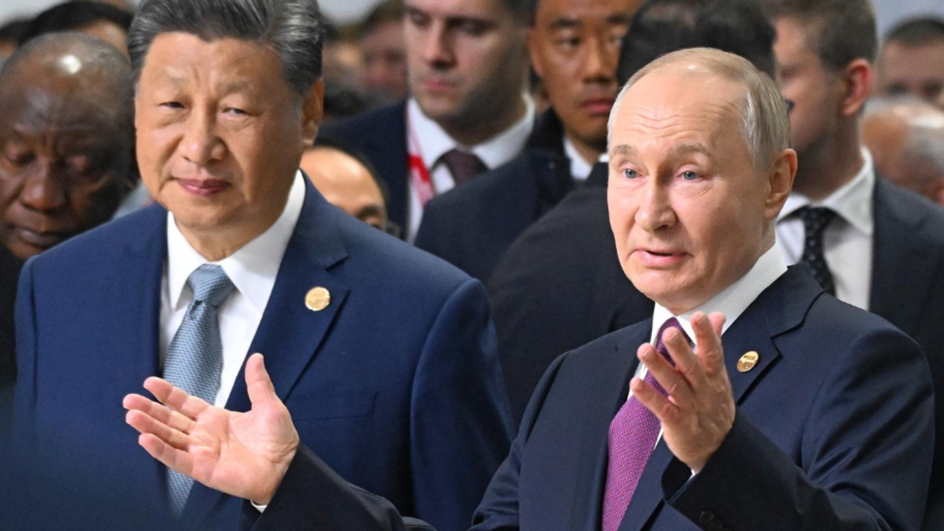 Vladimir Putin și Xi Jinping au pus lumea la cale în cadrul summitului BRICS. Foto: Profimedia