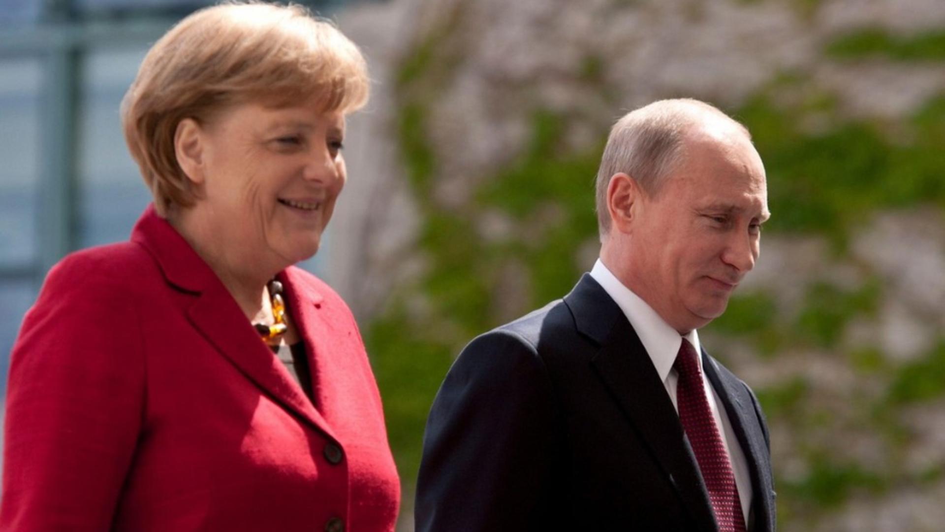 Vladimir Putin si Angela Merkel. Foto: Profimedia