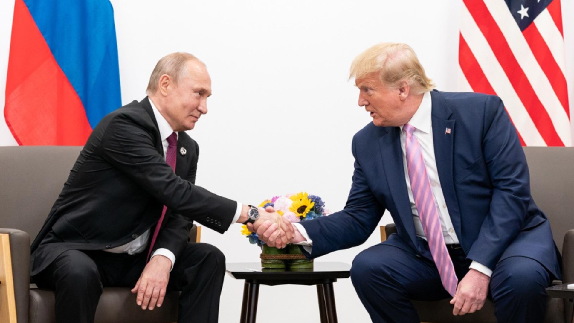 Vladimir Putin și Donald Trump în timpul unei întâlniri din 2019 (Profimedia)