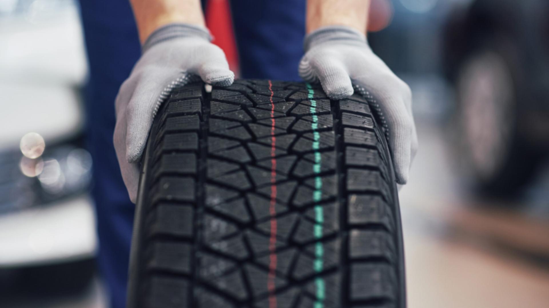 Misterul dungilor colorate de pe anvelopele noi: ce ascund și cum să nu fii păcălit