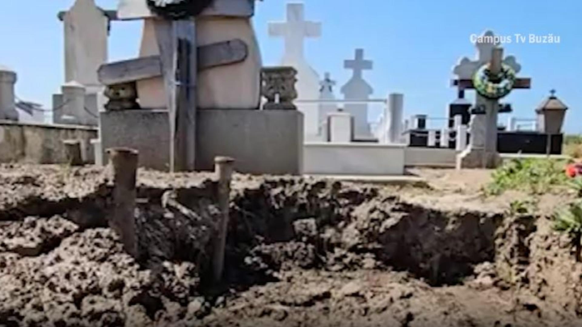 Situație critică: cimitir surpat din cauza ploilor torențiale