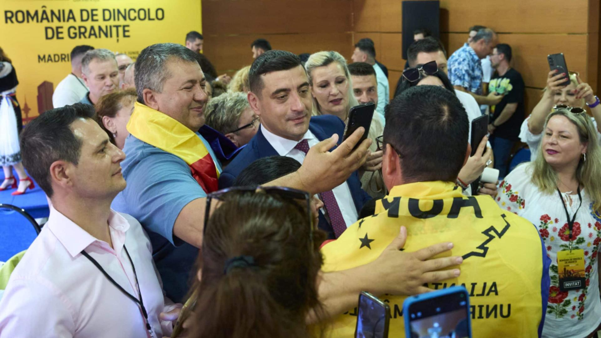 George Simion, baie de mulțime printre românii din Madrid. Foto/AUR